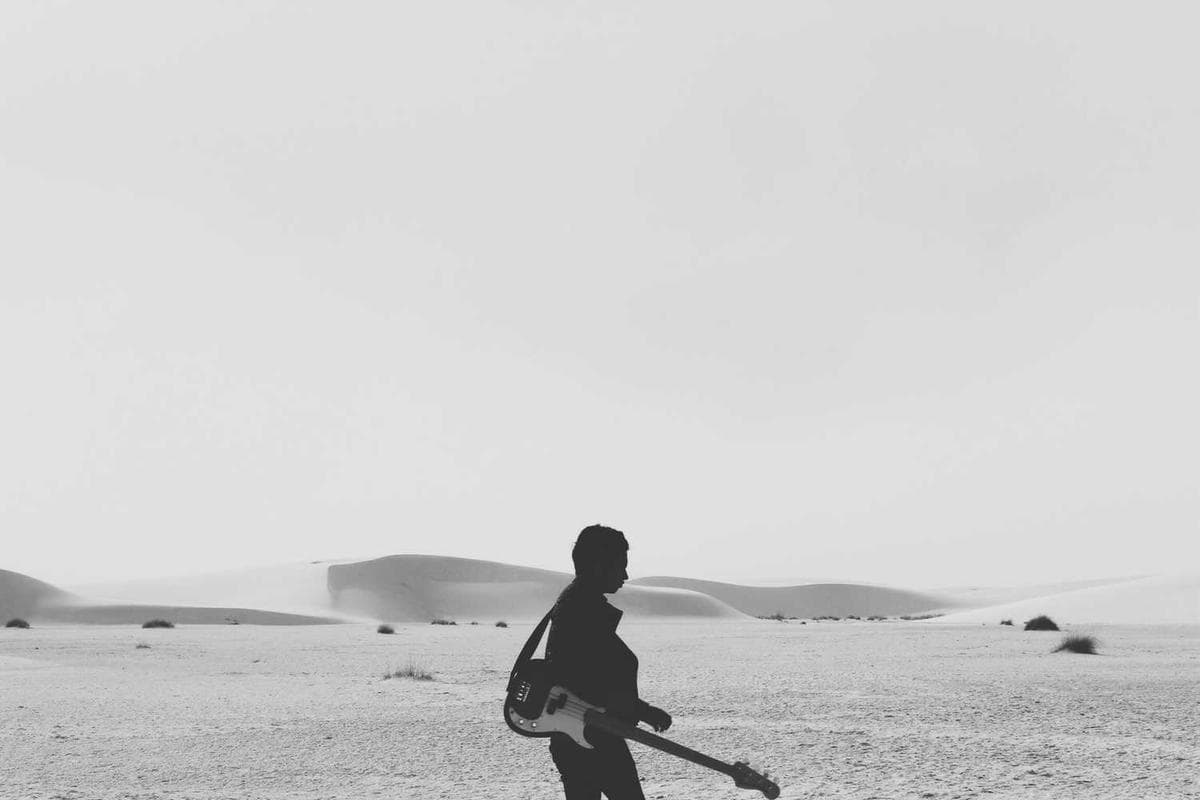 He stood over the body in the fading light